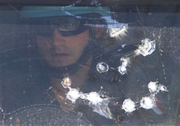  AP Photo  A French UN peacekeeper soldier, is seen through the damaged window of his armored vehicle, in Touline village, south of Lebanon, on Saturday July 3, 2010. A Lebanese military official says southern Lebanese villagers attacked the U.N. patrol with stones and eggs after the peacekeepers detained a villager. An Associated Press photographer saw at least one peacekeeper and one villagers slightly injured.